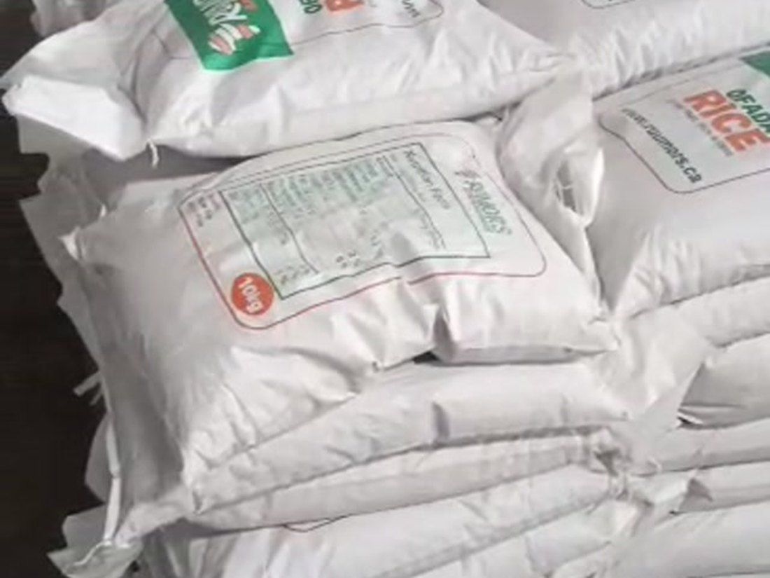 Pallets of stacked food sacks in the warehouse